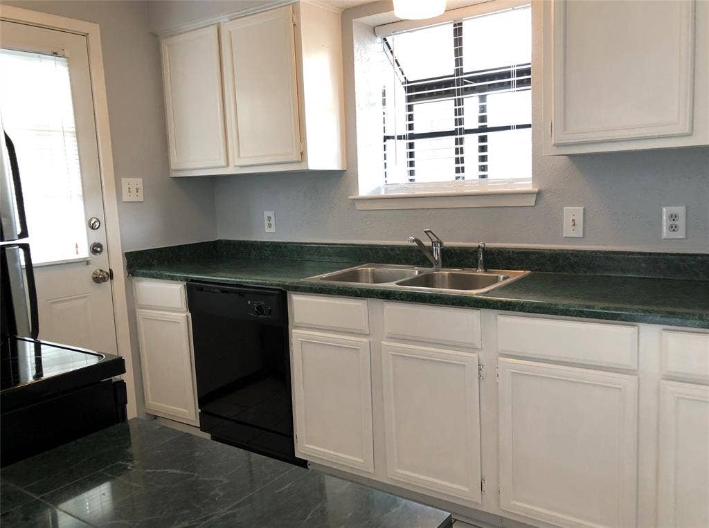 2111 E Belt Line Road, #1, Richardson, TX 75081 Galley kitchen with nearly new range