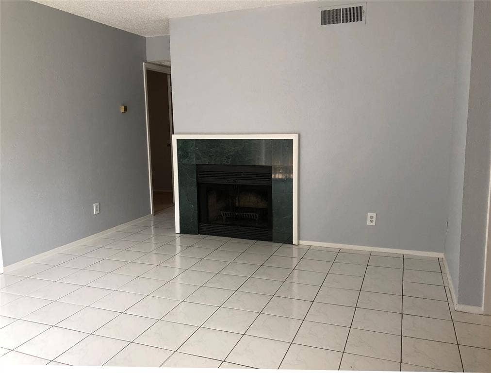 2111 E Belt Line Road, #1, Richardson, TX 75081 Easy to clean tile and fireplace