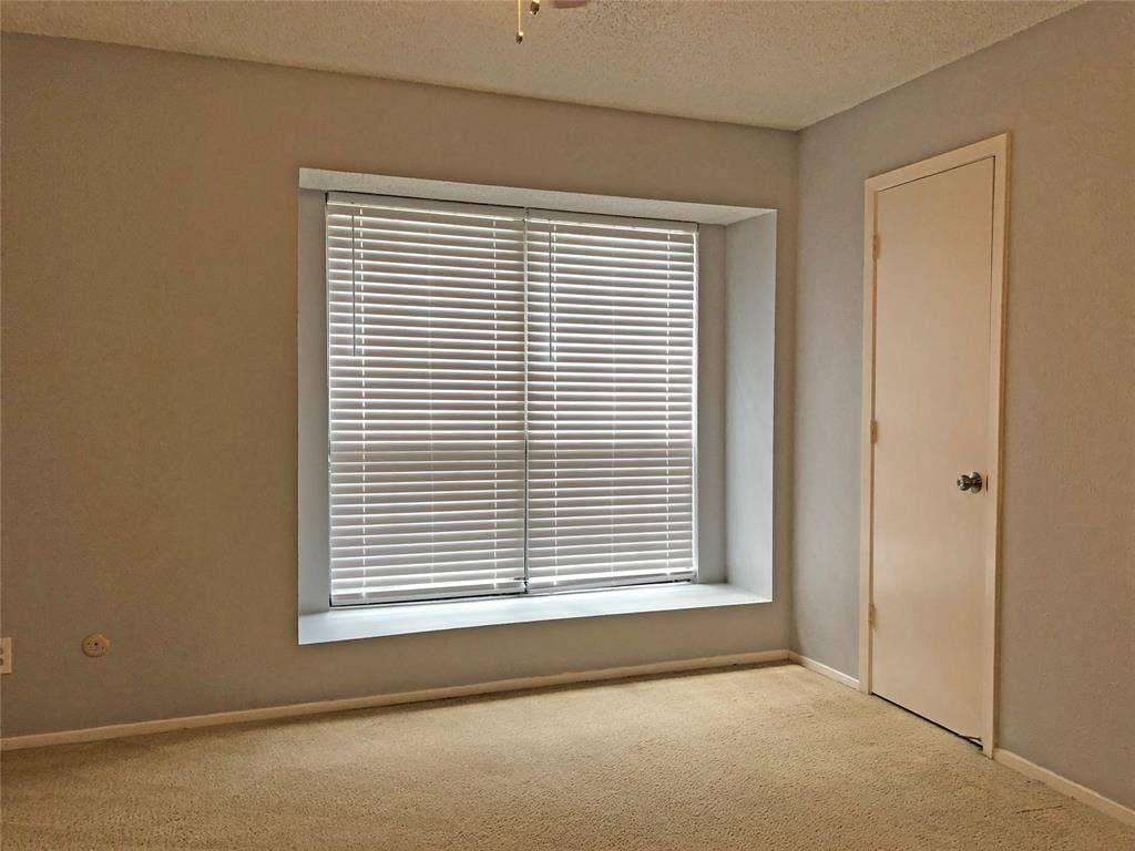 2111 E Belt Line Road, #1, Richardson, TX 75081 Bedroom has window seat