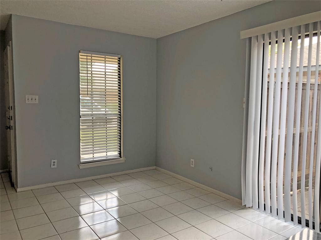 2111 E Belt Line Road, #1, Richardson, TX 75081 Living Area with access to patio