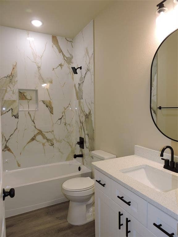 106 Navajo Drive, Mabank, TX 75156 White vanity with white countertop, round mirror, and matte black fixtures