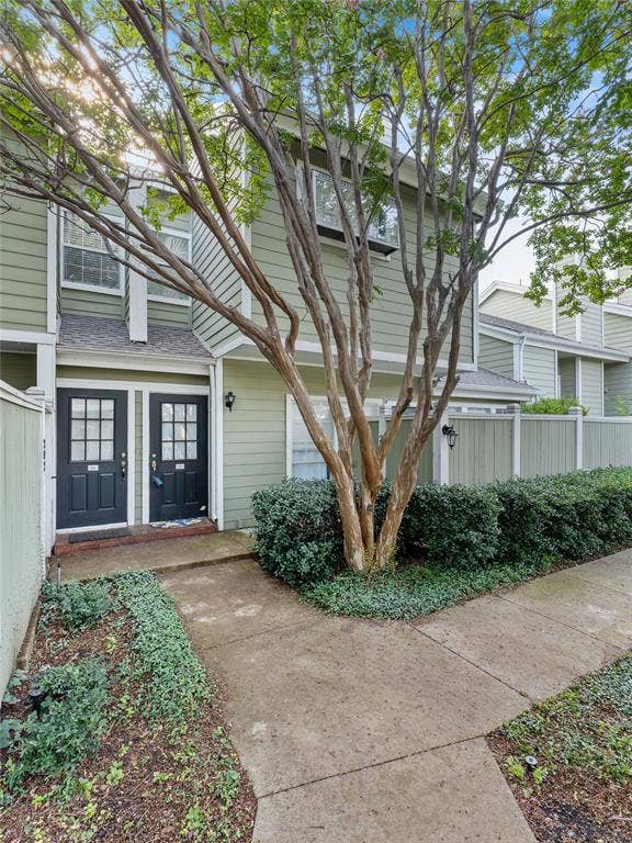 6220 Bentwood Trail, #205, Dallas, TX 75252 Siding exterior with multiple windows, complemented by mature trees and landscaping