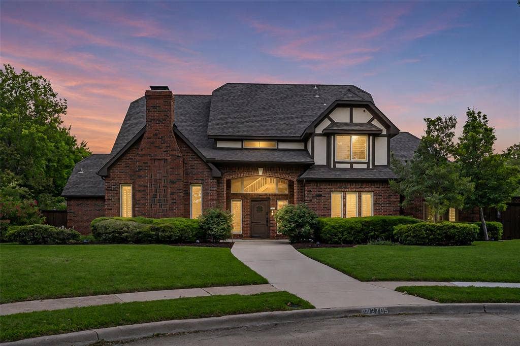 2705 Ithaca Court, Plano, TX 75025 Brick exterior with white and dark trim accents
