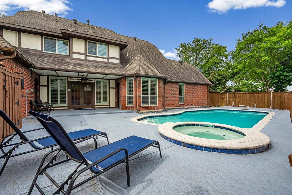 2705 Ithaca Court, Plano, TX 75025 Brick exterior with timber-frame detailing
