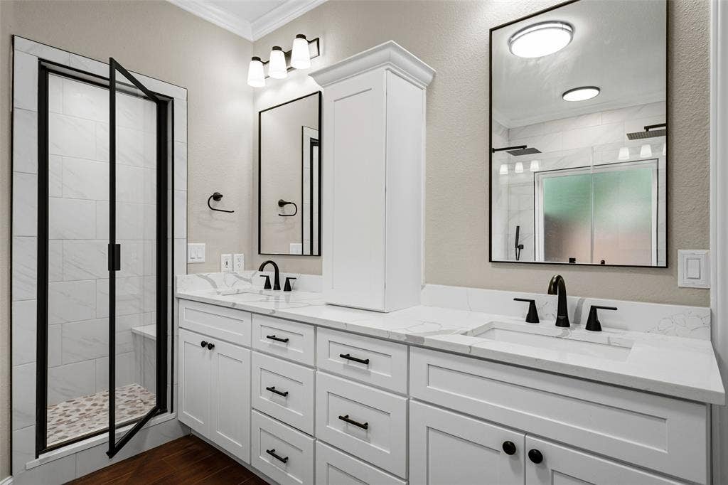 2705 Ithaca Court, Plano, TX 75025 Dual vanity with white cabinetry and integrated sinks