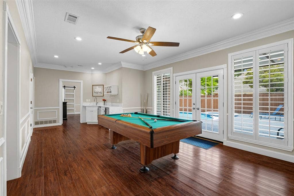 2705 Ithaca Court, Plano, TX 75025 Recessed lighting, wood-finish flooring, built-in wet bar with sink, French doors, and a ceiling fan