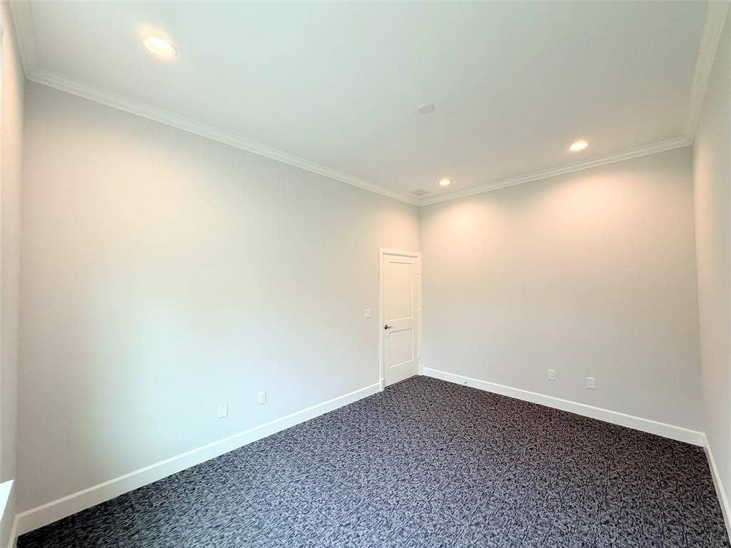 2120 Prairie Drive, #902, Prosper, TX 75078 Spacious room with neutral paint finishes, recessed ceiling lighting, and durable carpet flooring throughout