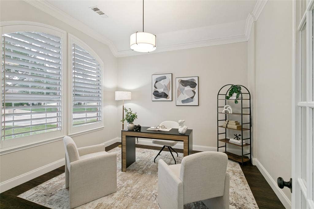 17 Adams Court, Mansfield, TX 76063 Arch-top windows with plantation shutters, dark wood-finish flooring, white crown molding, 10 ft ceiling, a drum pendant light fixture, french doors.