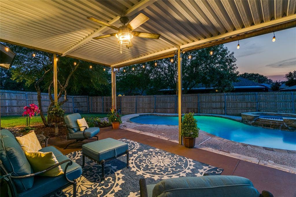 17 Adams Court, Mansfield, TX 76063 View looking from patio throudh the yards pool view.