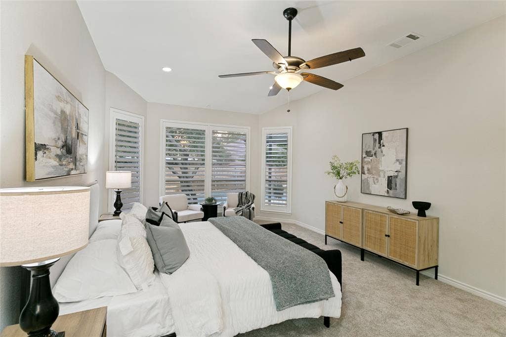 17 Adams Court, Mansfield, TX 76063 Vaulted ceiling, ceiling fan, recessed lighting, plantation shutters, and carpet flooring
