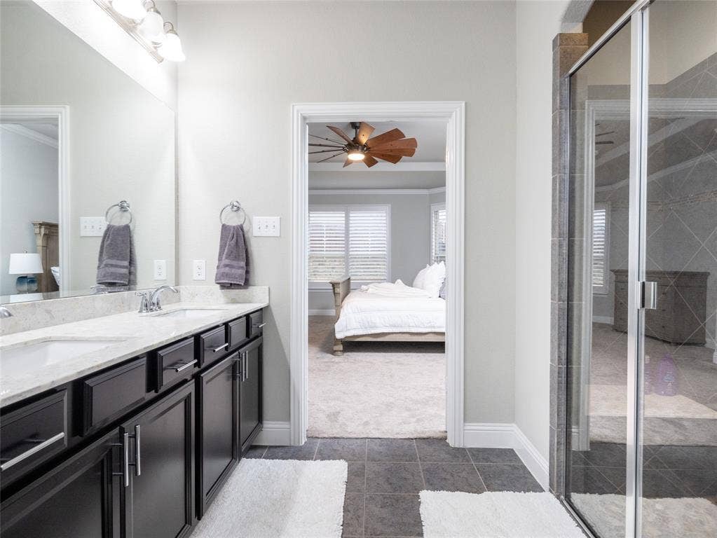 Double vanity with dual undermount sinks and chrome fixtures