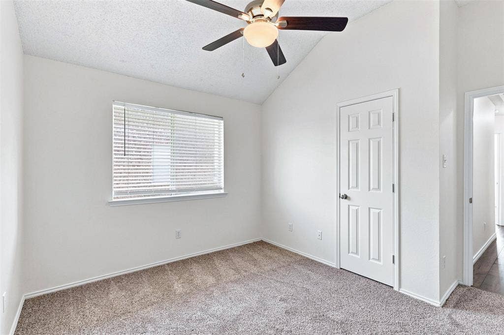 1110 Harvard Lane, Allen, TX 75002 Secondary bedroom. Fresh carpet. Vaulted Ceiling and Fan.