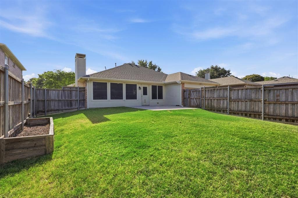 1110 Harvard Lane, Allen, TX 75002 Expansive backyard with garden bed ready for your plants