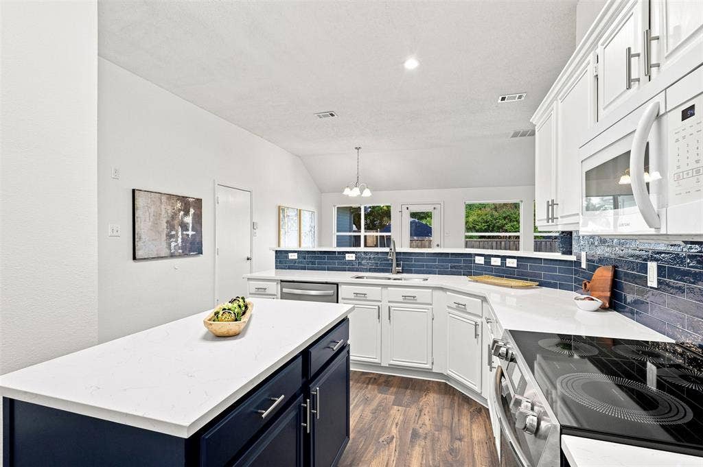 1110 Harvard Lane, Allen, TX 75002 Kitchen island features electrical on both sides.