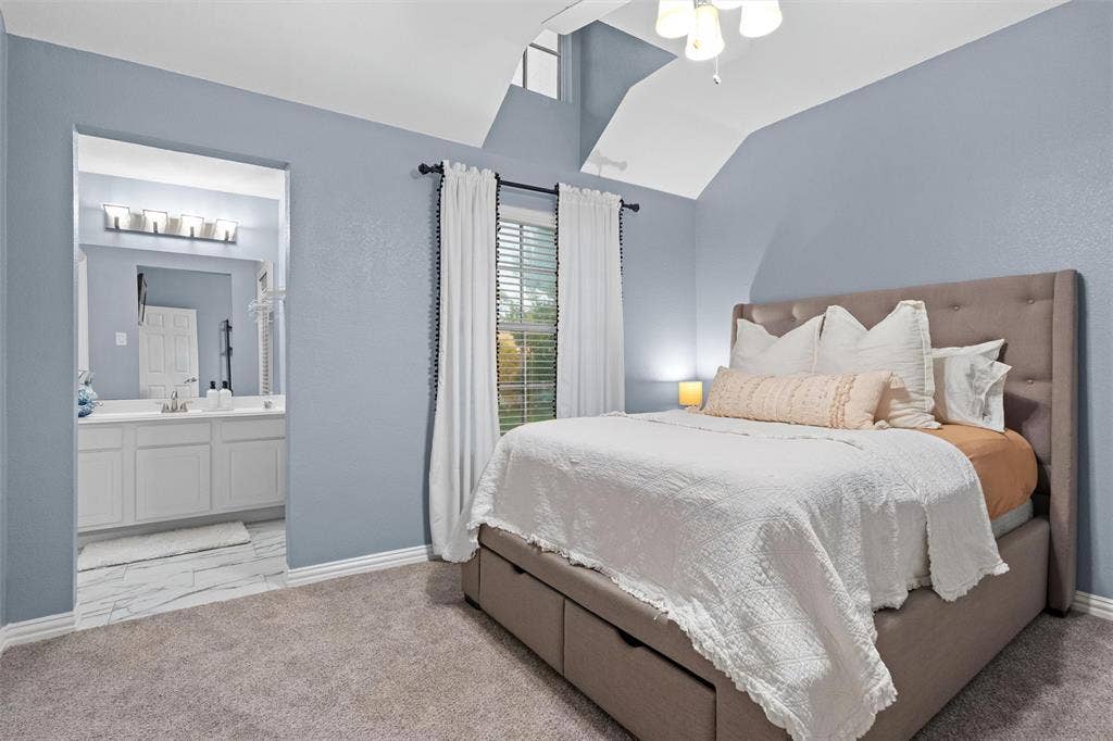 Upstairs bedroom with new carpet and jack and jill bath