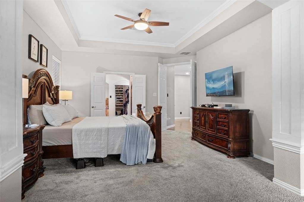 Primary bedroom and en suite bath with spacious walk in closet.
