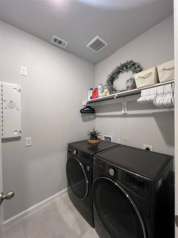 3210 Mattie Grey Lane, Melissa, TX 75454 Laundry room featuring baseboards and separate washer and dryer