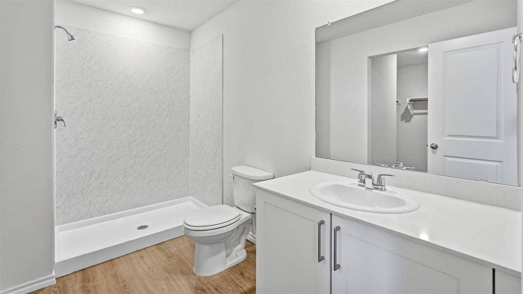 3327 Twilight Trail, Talty, TX 75126 White bathroom vanity with an integrated sink, polished chrome faucet, and quartz countertop