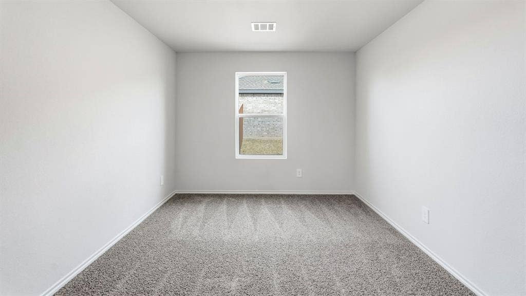 3327 Twilight Trail, Talty, TX 75126 Neutral-toned walls, carpeted flooring, and a single window