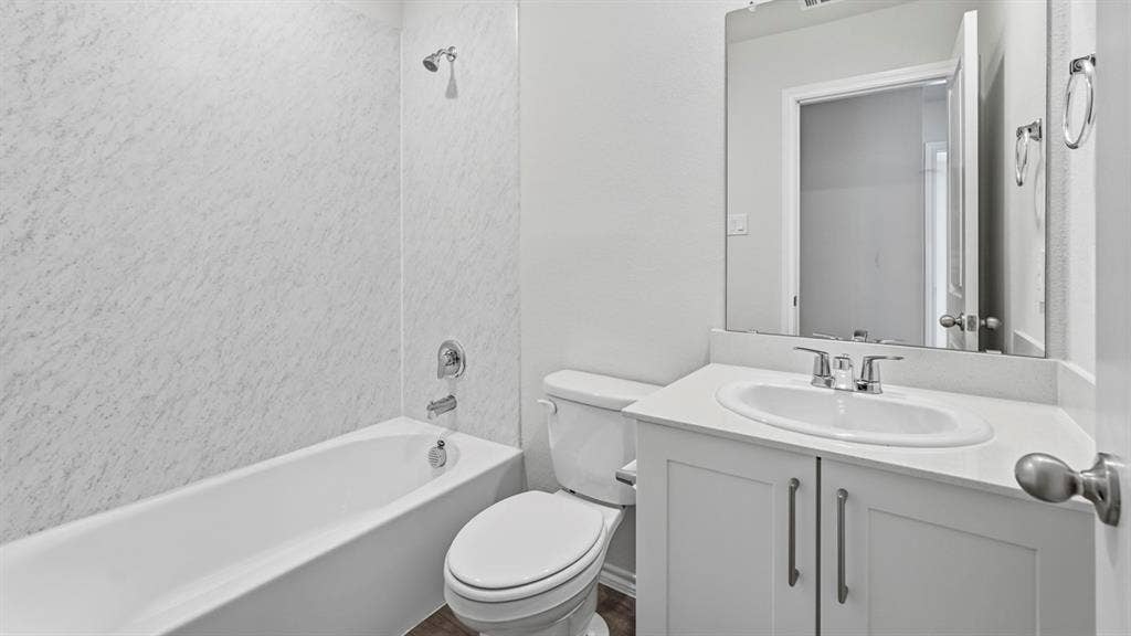 3327 Twilight Trail, Talty, TX 75126 White vanity with a built-in sink, chrome fixtures, and a framed mirror