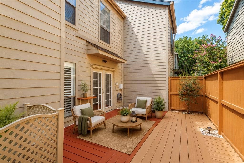 9400 Doliver Drive, #59, Houston, TX 77063 Private outdoor deck featuring dual-tone decking, a solid wooden privacy fence, and French doors