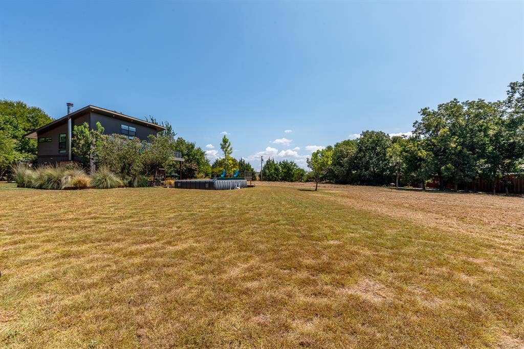 6448 County Road 437, Princeton, TX 75407 Expansive lawn area with mature trees and perimeter fencing
