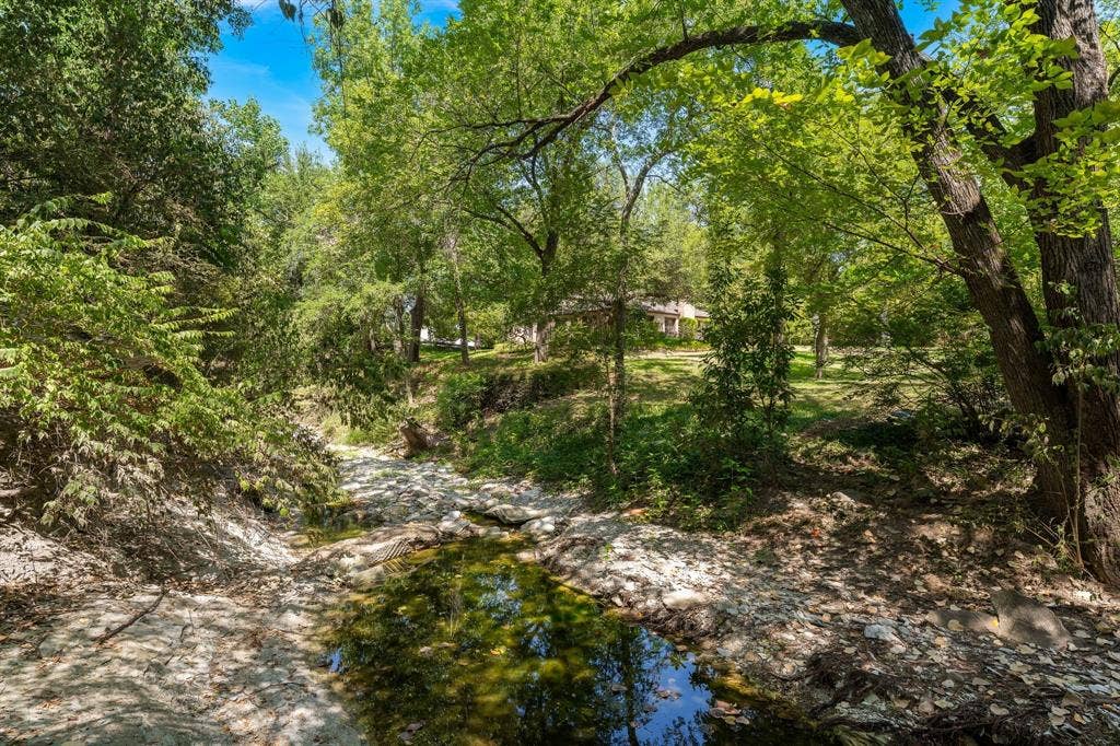 13828 Hillcrest Road, Dallas, TX 75240 Creek