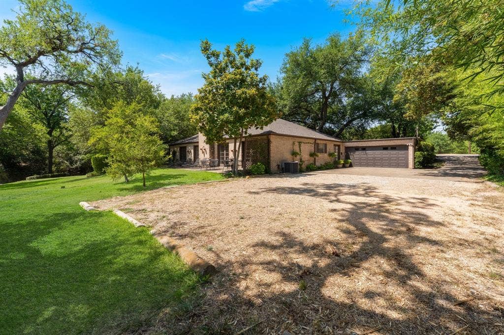13828 Hillcrest Road, Dallas, TX 75240 Extra Parking in the back along with 2 car garage.