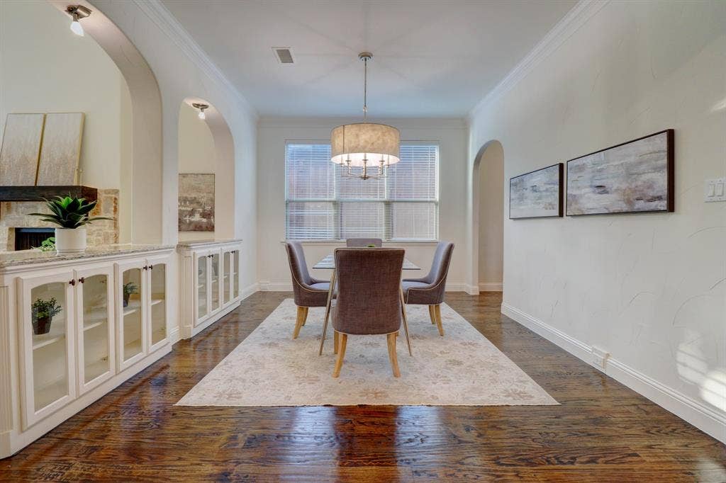11559 Ashley Lane, Frisco, TX 75035 Rich wood-finish flooring complements archway openings