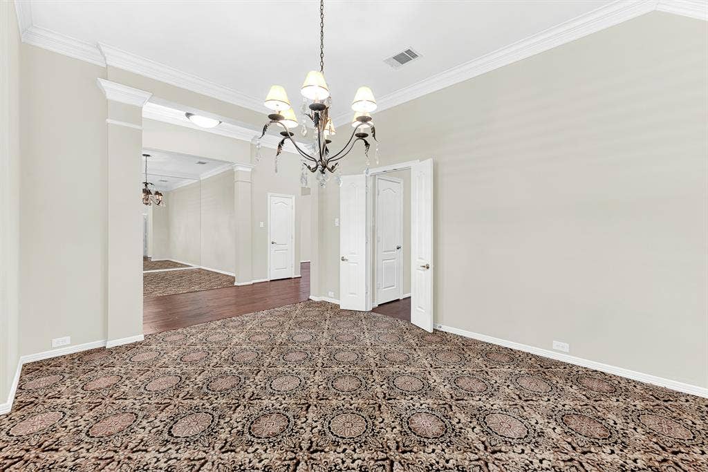 3217 Royal Melbourne Drive, Plano, TX 75093 Framed by double doors and refined crown molding, this view highlights the easy flow into adjoining living space, kitchen and foyer. Imagine flowing effortlessly between cocktail hour and dinner while entertaining friends in style.