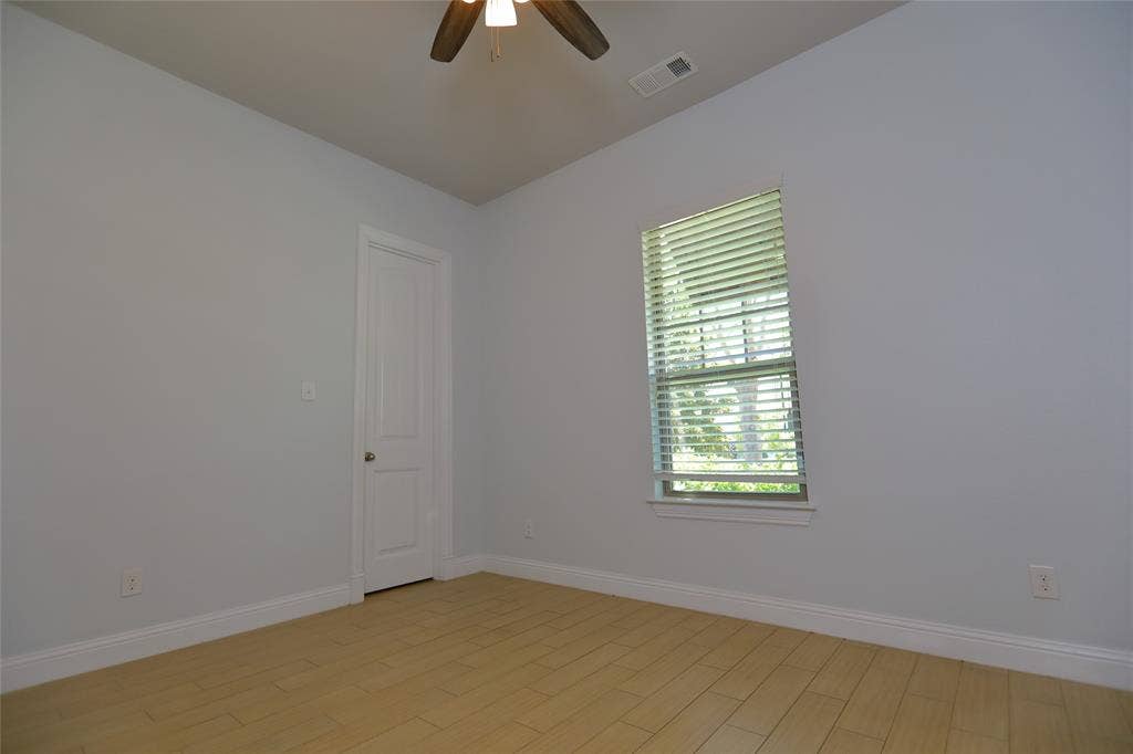 3707 Plum Vista Place, Arlington, TX 76005 Wood-finish flooring paired with light gray walls