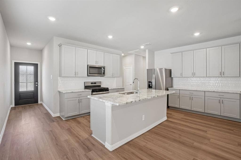 1617 Arches Road, Anna, TX 75409 Photo is not of the actual home, but is an inspirational photo of builder’s model home and may depict options, furnishings, and/or decorator features that are not included.