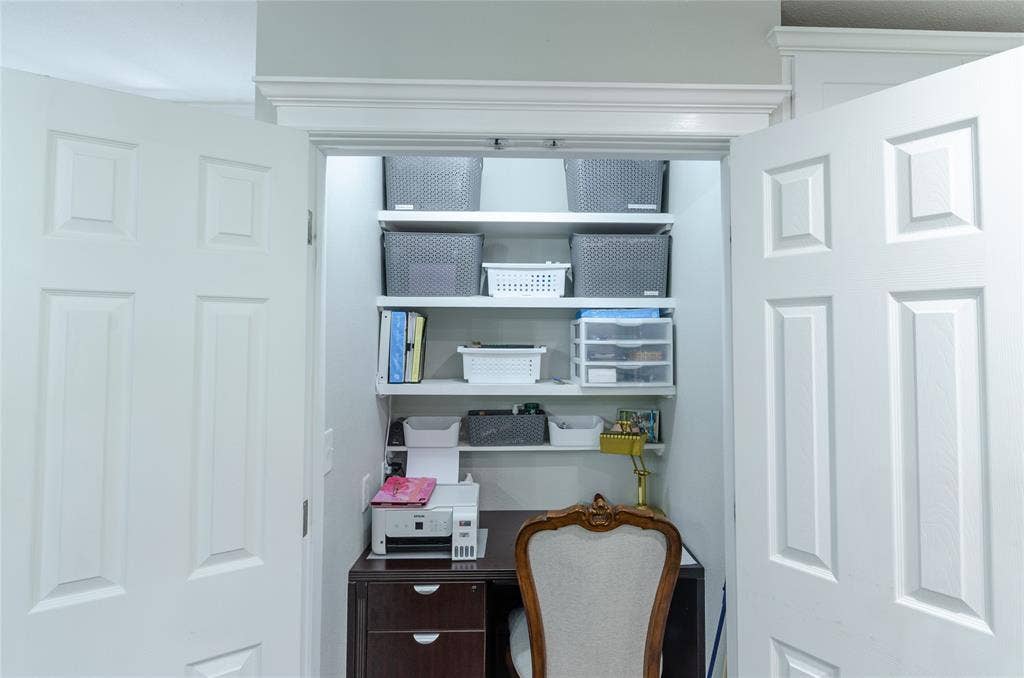 3613 Windmill Hill Street, Waco, TX 76710 Built-in shelving, dark wood-finish desk, and white paneled doors