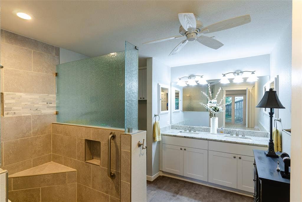 3613 Windmill Hill Street, Waco, TX 76710 Walk-in shower with textured glass partition and integrated bench