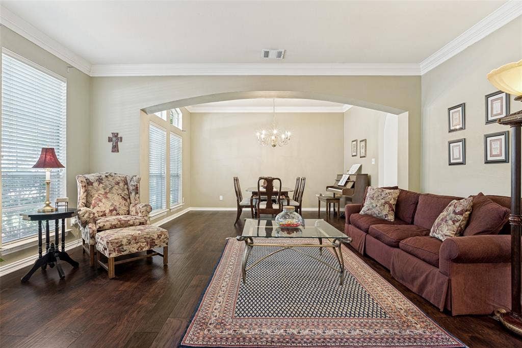 4308 Cedar Valley Drive, Plano, TX 75024 Front living area opens to formal dining with wall of windows