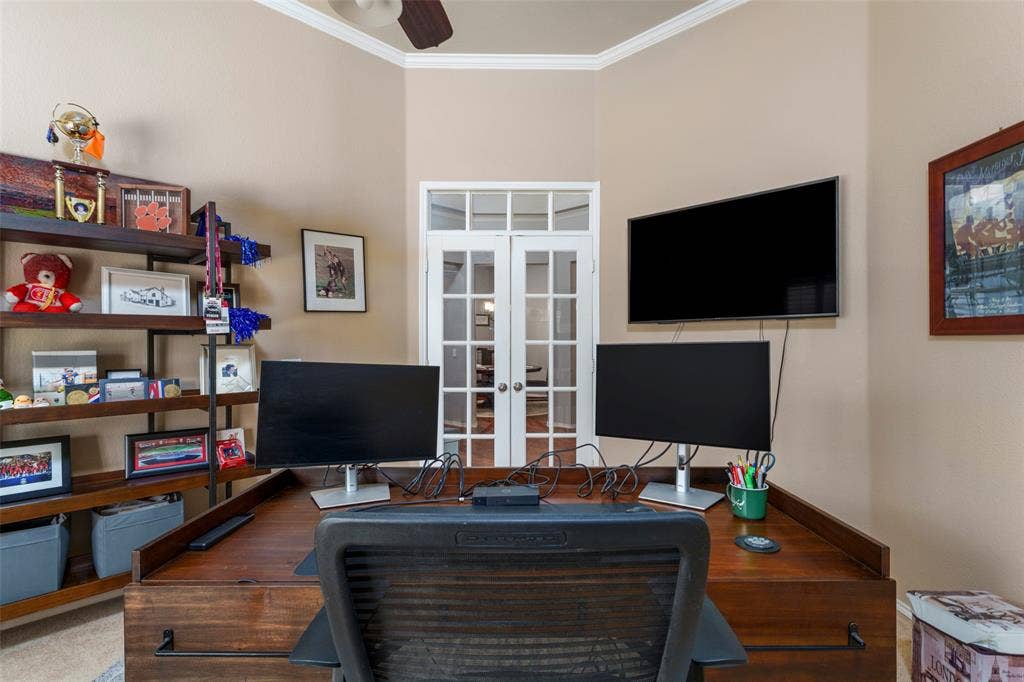 1620 Babbling Brook Drive, Grand Prairie, TX 75050 Room featuring crown molding, neutral wall color, and a ceiling fan