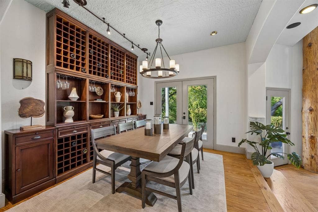 7750 Cottonwood Street, Frisco, TX 75033 Custom kitchen opens seamlessly to the dining and living areas.