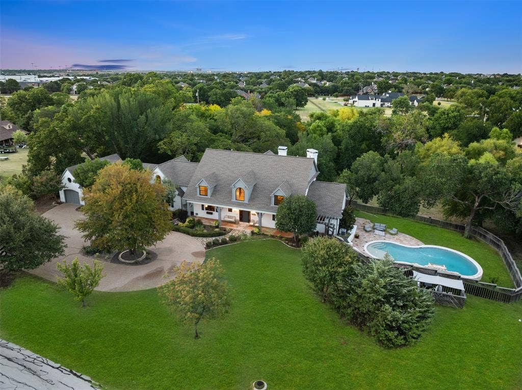 7750 Cottonwood Street, Frisco, TX 75033 Beautiful architectural details surrounded by mature landscaping.