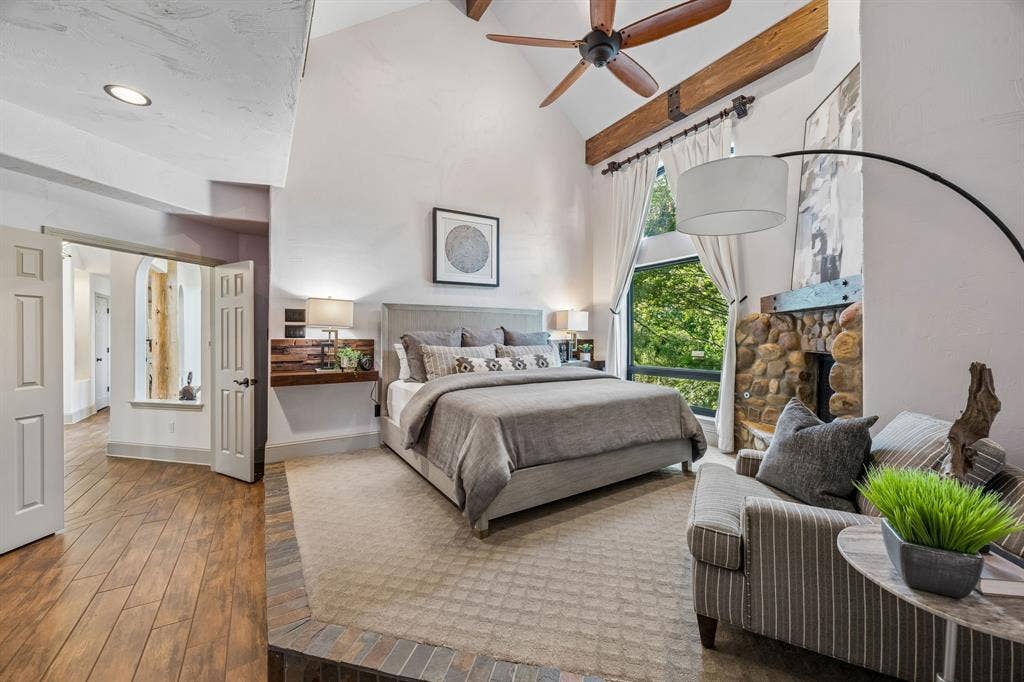 7750 Cottonwood Street, Frisco, TX 75033 Romantic stone fireplace creates a warm and inviting primary suite.