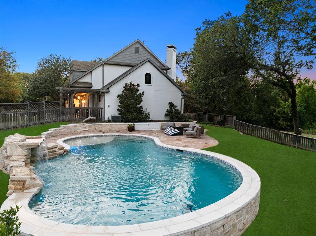 7750 Cottonwood Street, Frisco, TX 75033 Resort-style pool tucked into a beautiful natural setting.