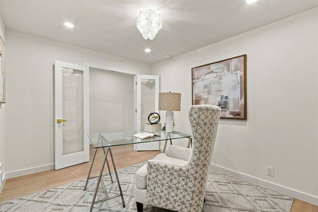 1409 Navaho Trail, Richardson, TX 75080 Recessed lighting, wood-finish flooring, and white walls