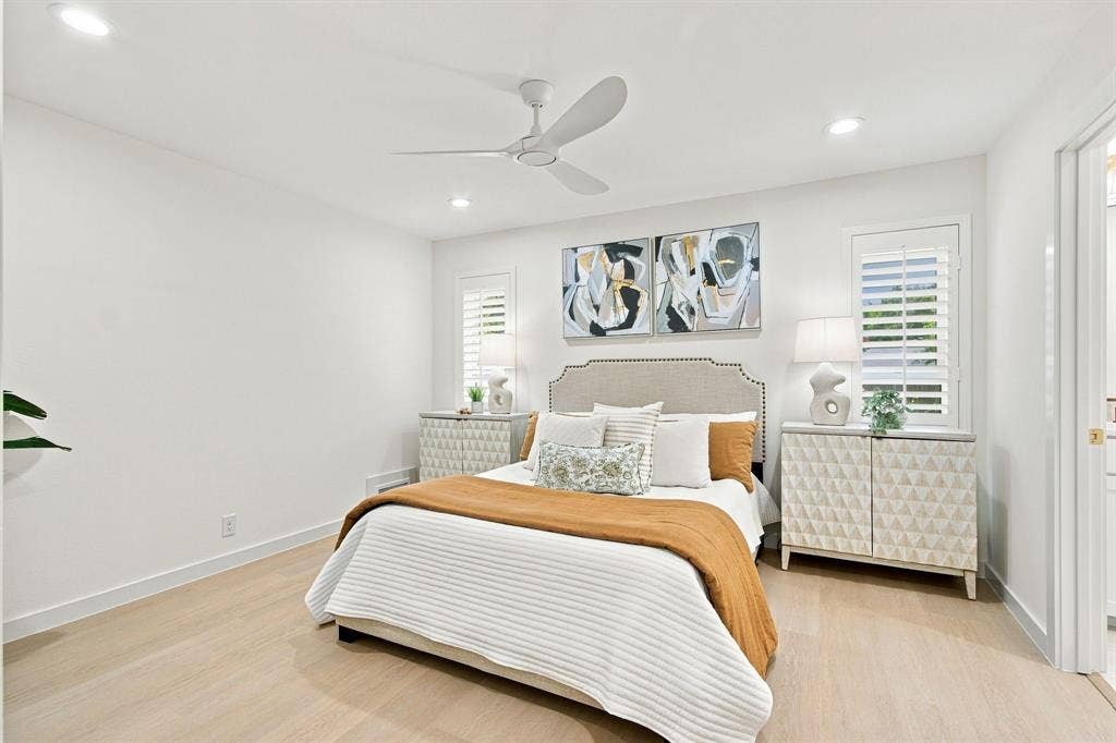 1409 Navaho Trail, Richardson, TX 75080 Recessed lighting, wood-finish flooring, white walls, ceiling fan, and window with plantation shutters