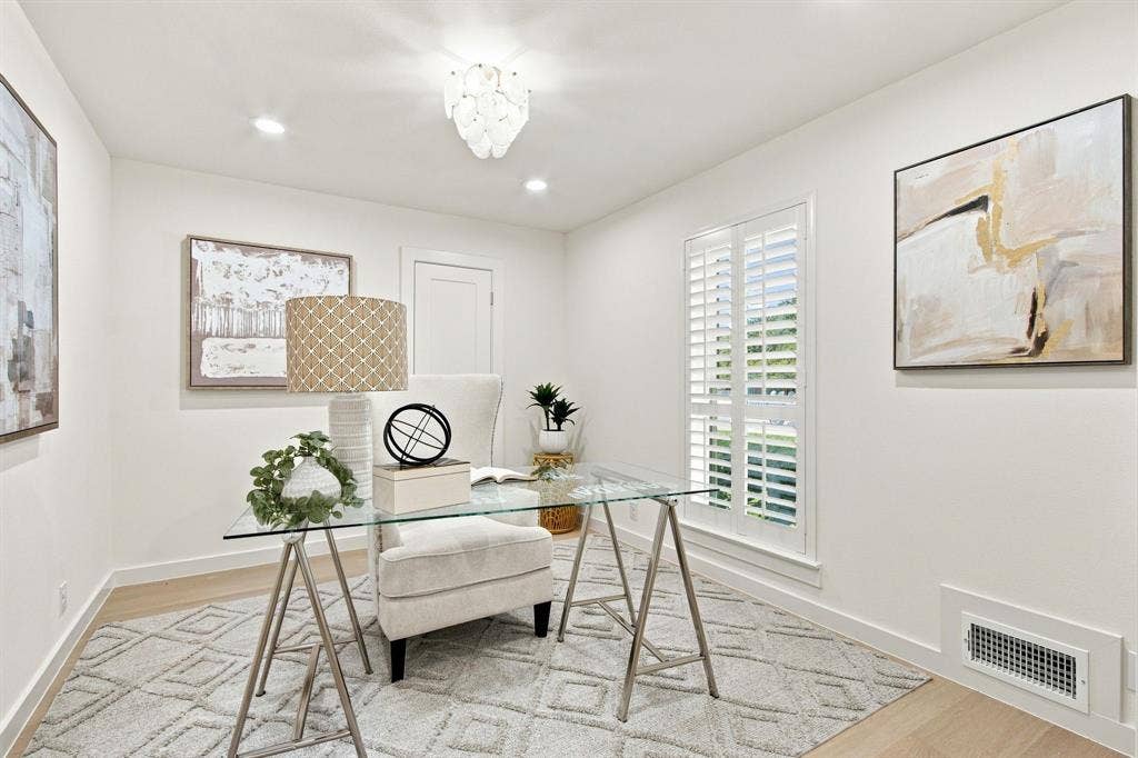 1409 Navaho Trail, Richardson, TX 75080 Recessed lighting, beautiful chandelier, closet with electrical for printer and plantation shutters!