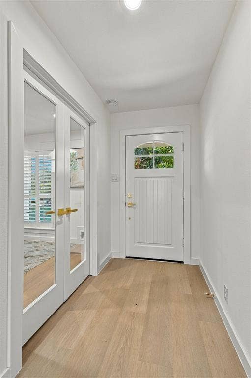 1409 Navaho Trail, Richardson, TX 75080 Entry with LVP flooring - office with double doors with glass.