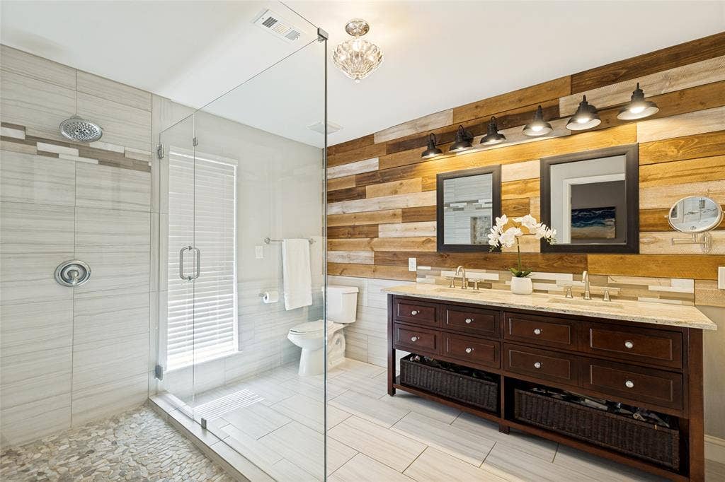 Spacious primary bath with oversized shower.