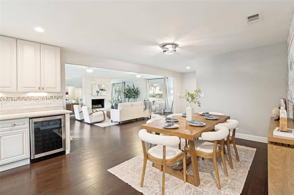 The wood floors and soft neutral colors add warmth.
