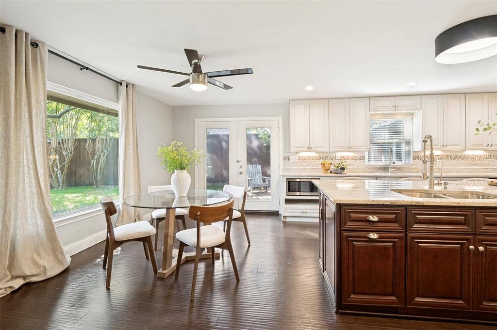 Spacious breakfast area leads to the pation for grilling and outdoor seating.