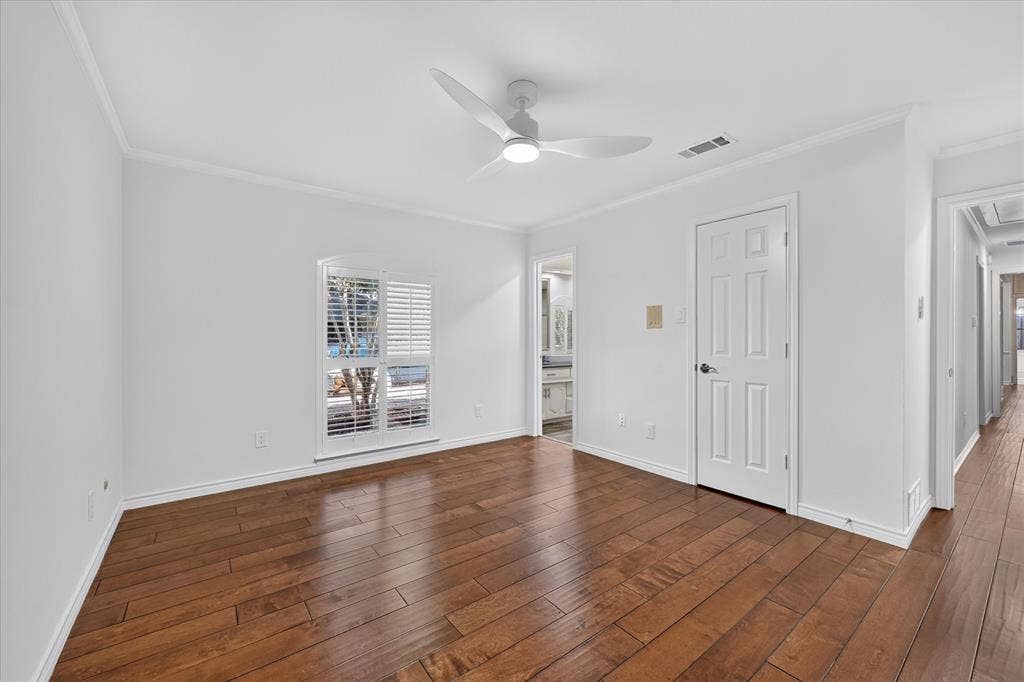wood-finish flooring, shutters, large closet, ceiling fan
