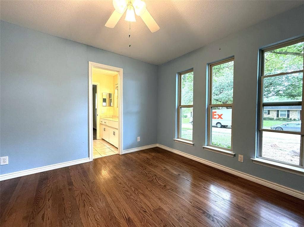 1116 Elizabeth Lane, Richardson, TX 75080 The first bedroom opens to a bath shared by the second bedroom in southeast corner of the house