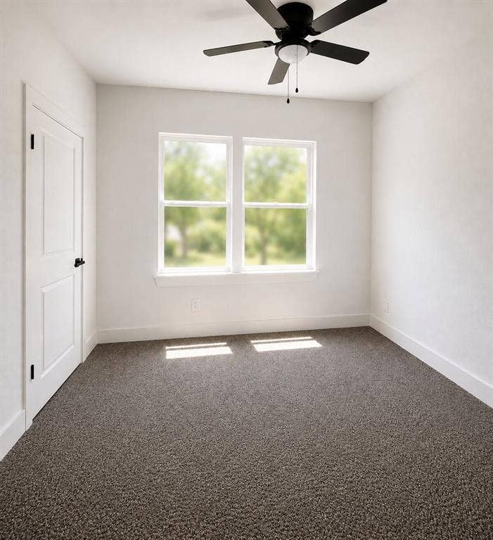 2542 Hooper Street, Dallas, TX 75215 Ceiling fan with integrated lighting, two paneled windows, white trim, textured carpet, and a paneled door